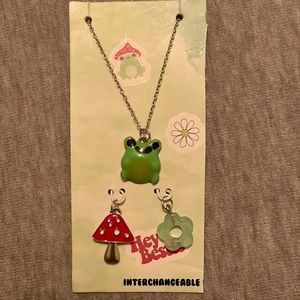 Cute green frog necklace set! There is a mushroom and a green flower!